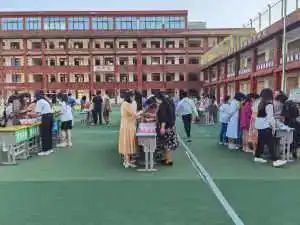 品味端午,传承文明潢川县实验小学教育集团举行端午节趣味包粽子活动
