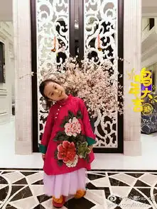 甜馨红衣迎财神喜庆劲十足扎俩小辫儿卖萌逗趣8894607
