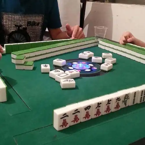 麻将桌上,牌品看人品
