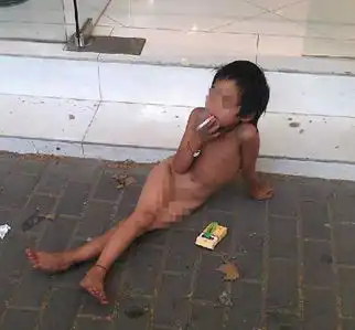 6岁女童抽烟街头乞讨盘点街头行乞者

