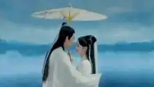 妹妹你是我的人白娘子许仙,断桥相会,雨伞是媒红
